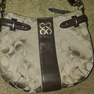Small designer print handbag